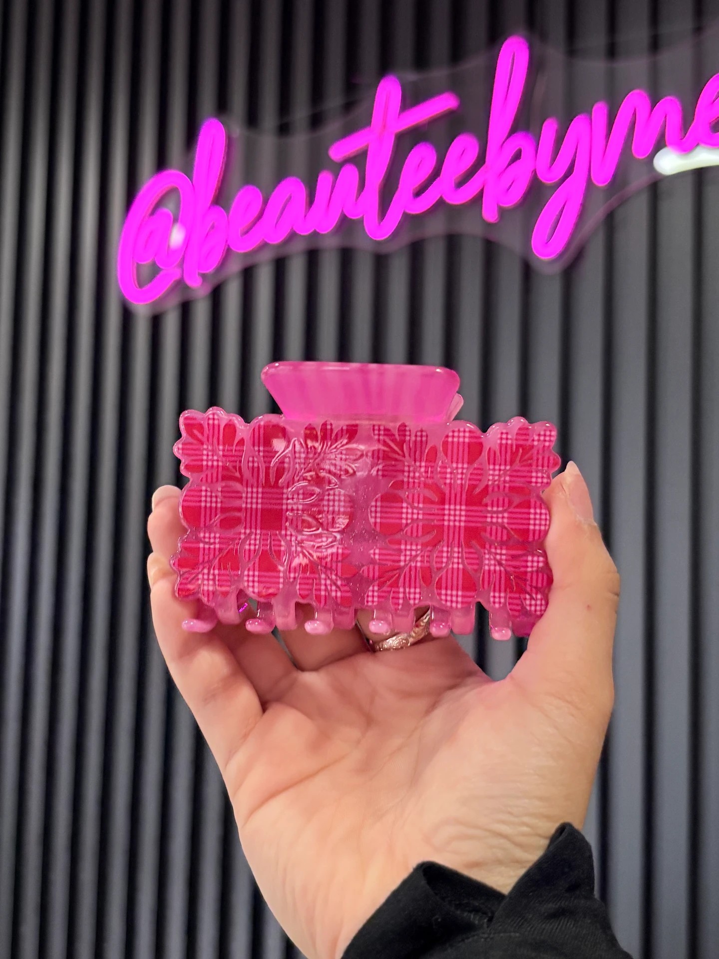 Pink Plaid Quilt Infinity Clip held in hand